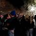 Michigan freshman Meredith Starkman and senior Devin Rossinsky embrace on campus after President Obama is elected to a second term Tuesday. Daniel Brenner I AnnArbor.com